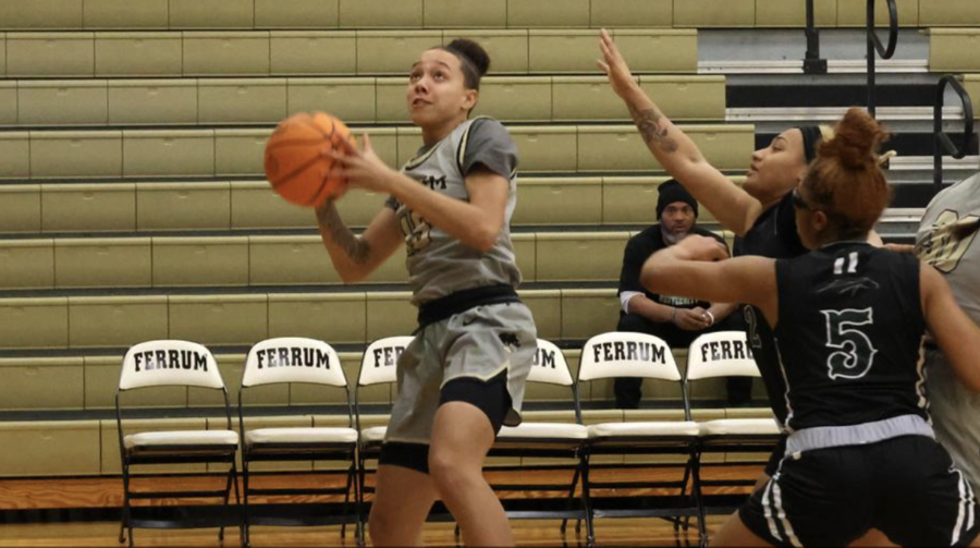 Aiesha+Martin%2C+senior%2C+prepares+to+drop+two+of+her+20+points+against+Eastern+Mennonite.