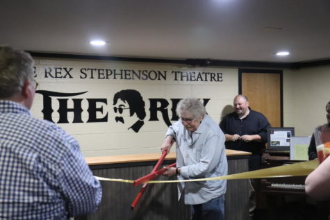 Rex Stephenson, Emeritus professor of Drama, cuts ribbon to open the Rex Theatre. 