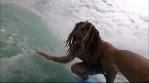 Braxton Hughes, graduate student and quarterback, grew up surfing on the Outer Banks of North Carolina.