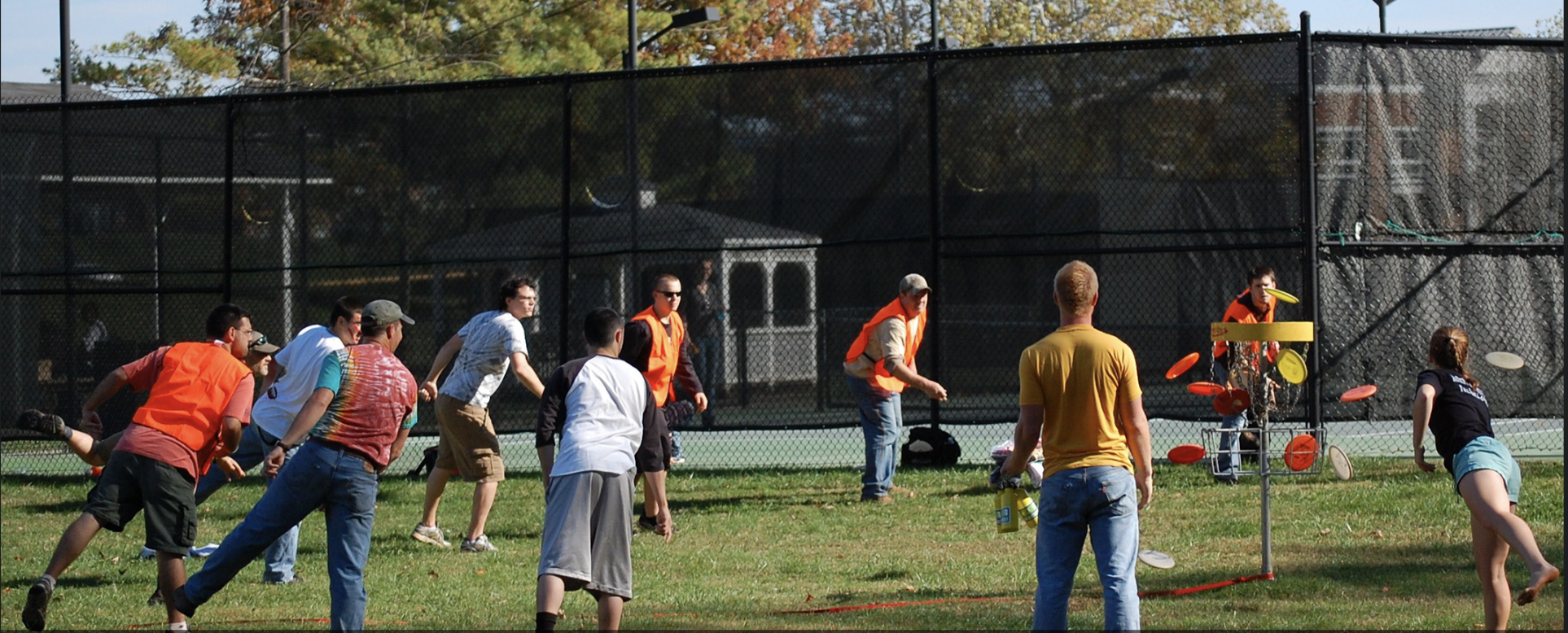 Students participate in disc golf at the colleges practice tee.