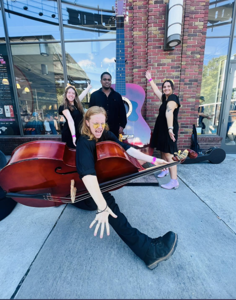 From left: Orchestra Appalachia members Rhiannon Anderson, freshman; Django Burgess, freshman; Ryon Johnson, junior; and Emily Walker, junior; take time for a photo at the Rhythm and Roots Festival in Bristol, VA--the birthplace of country music. 