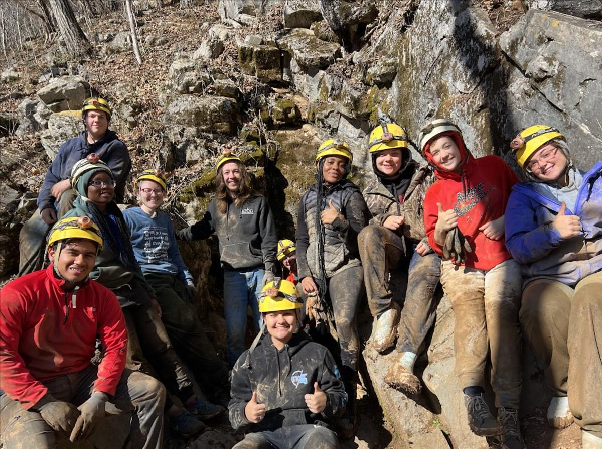 Students emerge from exploring Tawneys Cave just outside of Blacksburg on a Norton Outdoor Adventures caving trip during the Spring 23 semester. 
