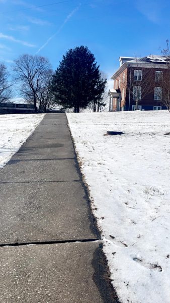 Campus sidewalks are coated in ice following the winter weather that greeted the college as this Spring semester began.