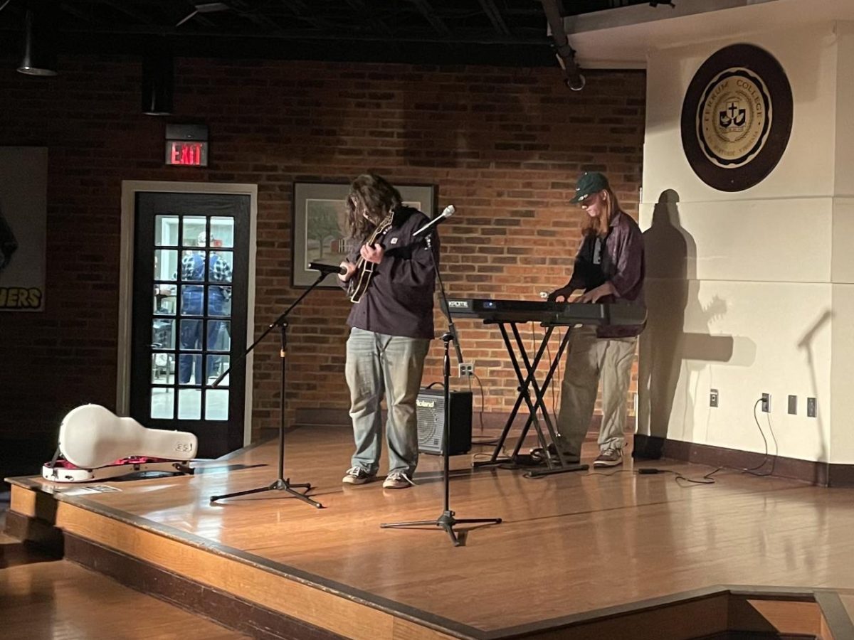 Stuart Werner, junior, and Django Burgess, freshman, perform their set with Werner on the mandolin and Burgess on the keyboard.