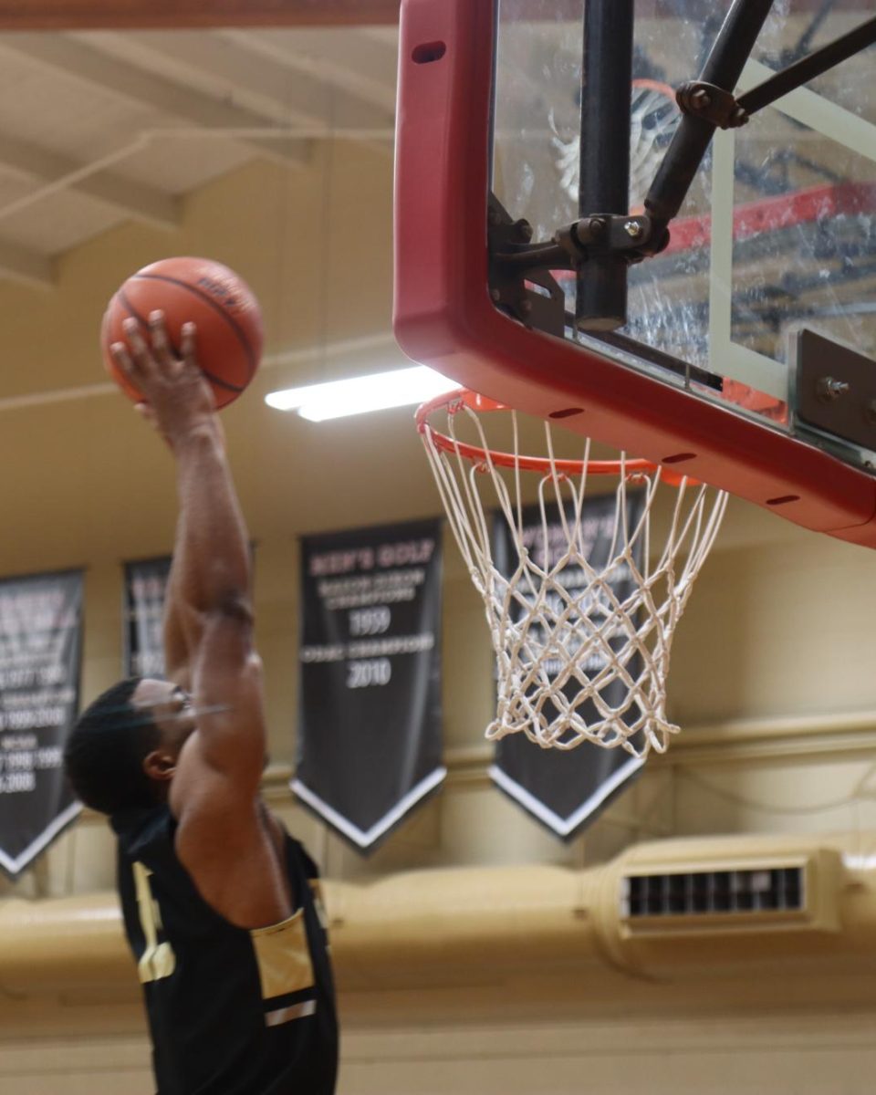 Darwin Randolph, junior, puts the proverbial nail in the coffin against Bridgewater Monday night with a dunk that helped keep the Panther dream alive.