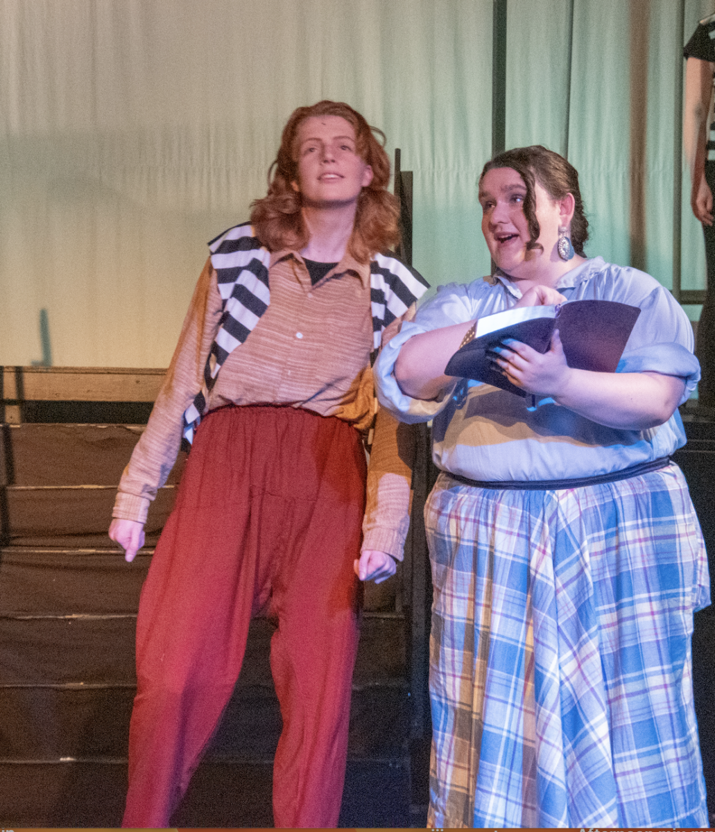 Seniors TK Baker, left, and Ashley Patrick played the roles of Joseph and the Narrator, respectively.