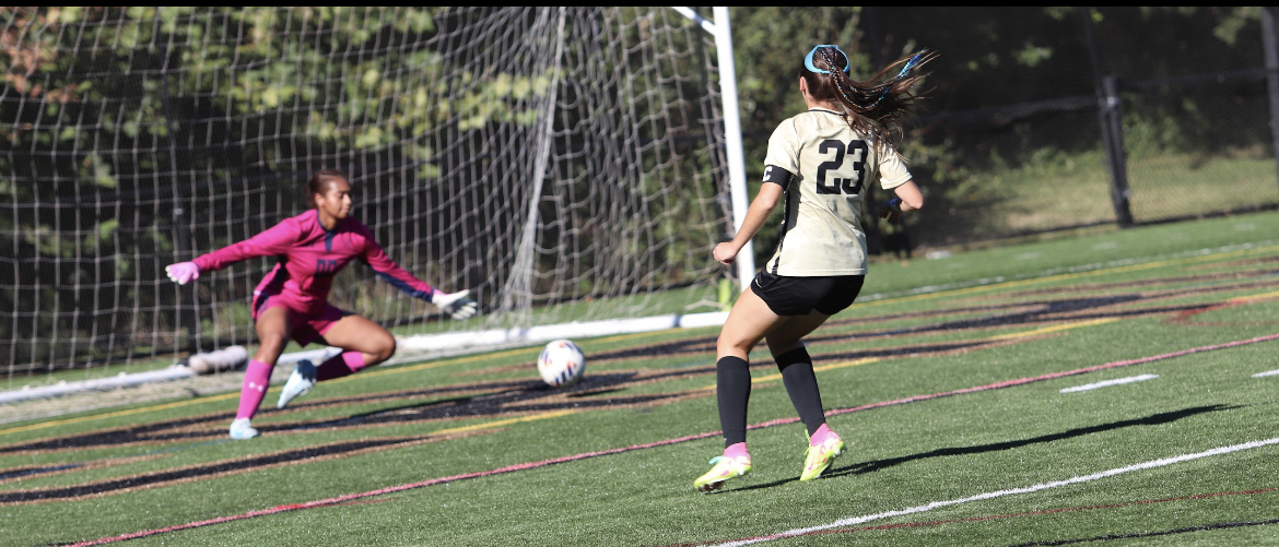 Brianna Bitz, grad student, leads the undefeated Panthers in goals scored with seven in six matches. Here, she slips one past the Virginia State goal keeper.