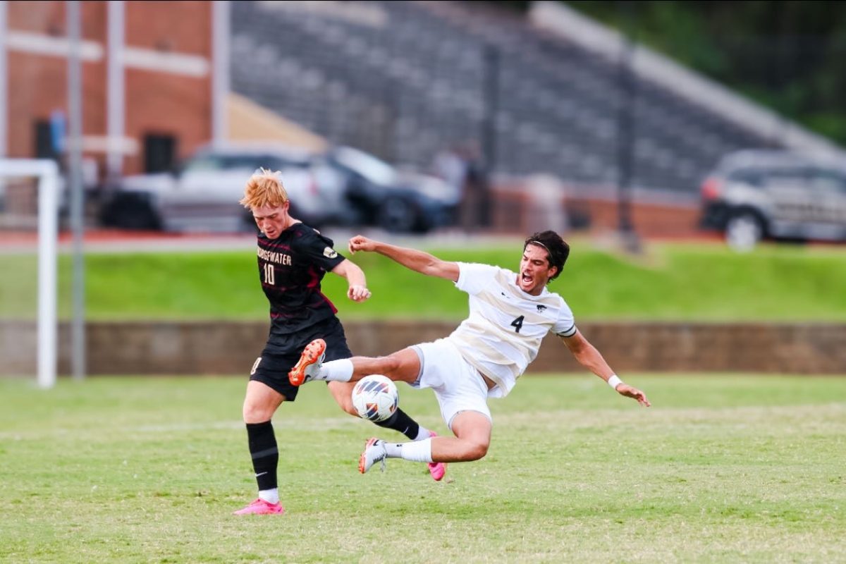 Sophomore Daniel Ginocchi defends the ball from his opponent. 