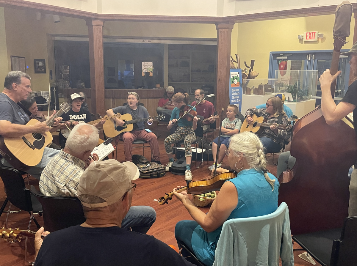 College students and staff join community members in a musical performance.