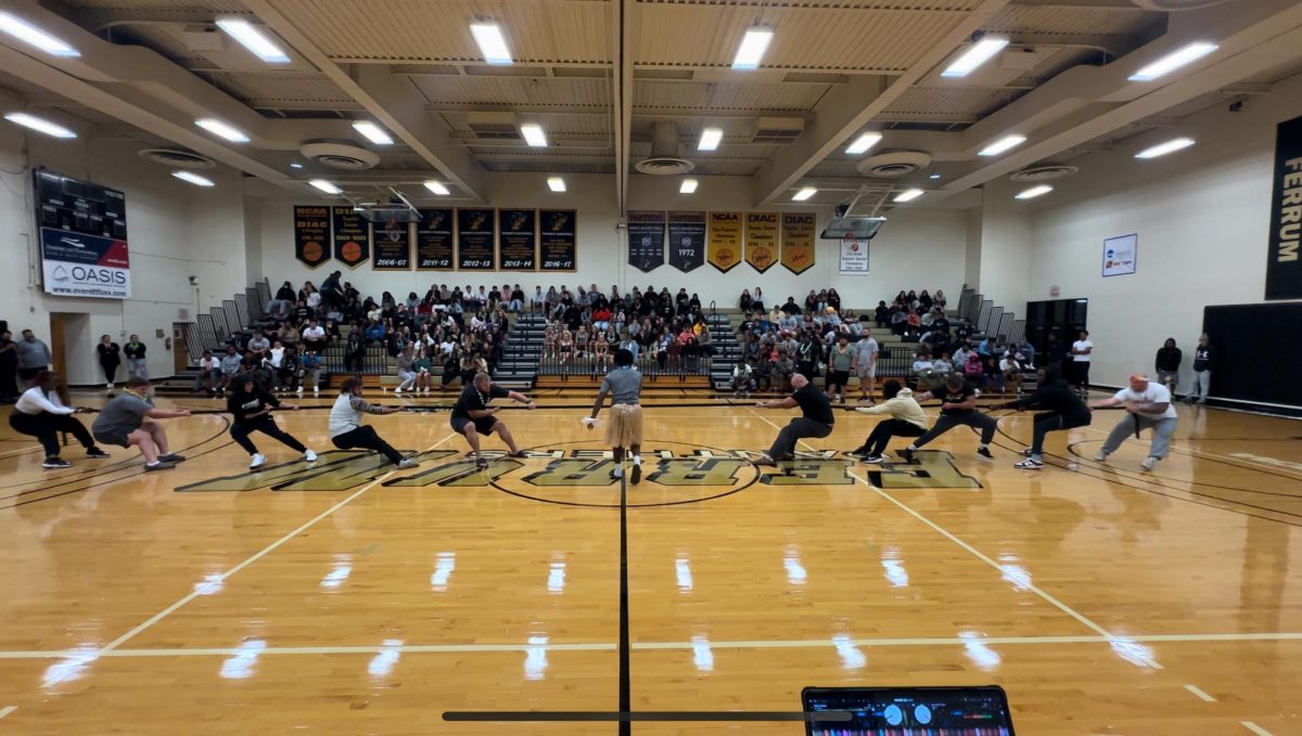 The junior class, left, faces the senior class in a Homecoming kick-off contest of tug-of-war.