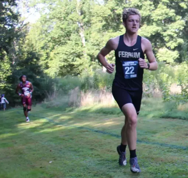 Junior Josh Mills leads the pack for the Panthers at last Saturday's meet. 