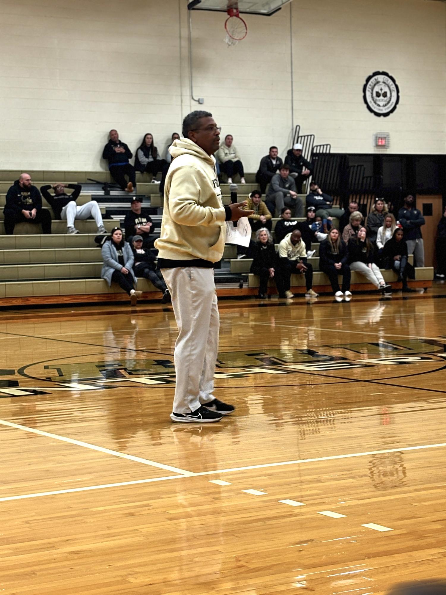 Athletic Director Cleive Adams speaks to athletes and staff at the spring athletic meeting.