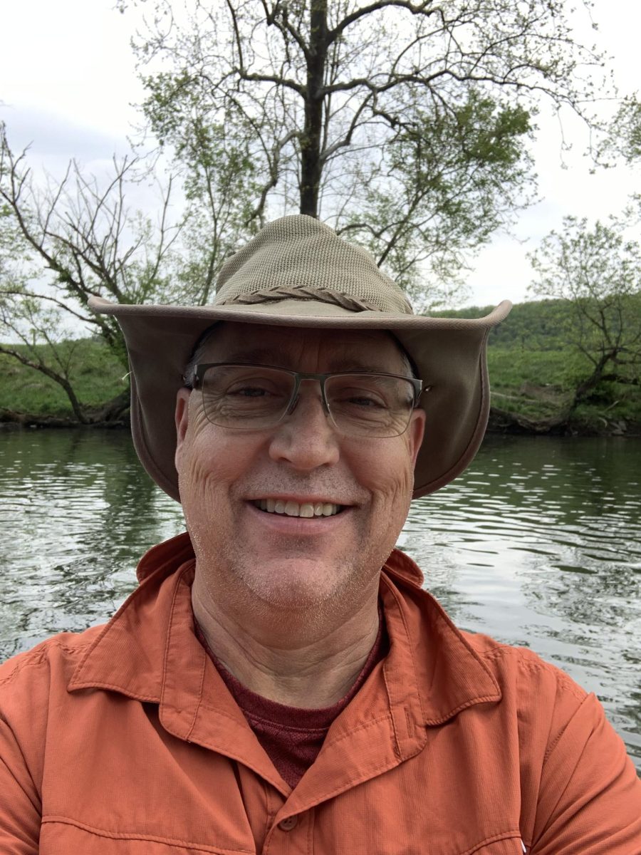 Professor Dan Caston, recent appointee to the Virginia Recreation and Parks Society, smiles as he finds himself in his element of the great outdoors.