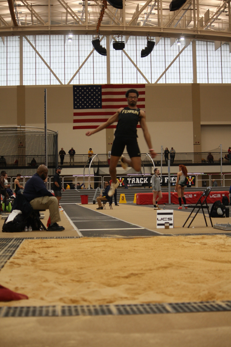 Junior Deonte Lawson competes in the triple jump and sets a new personal record. 