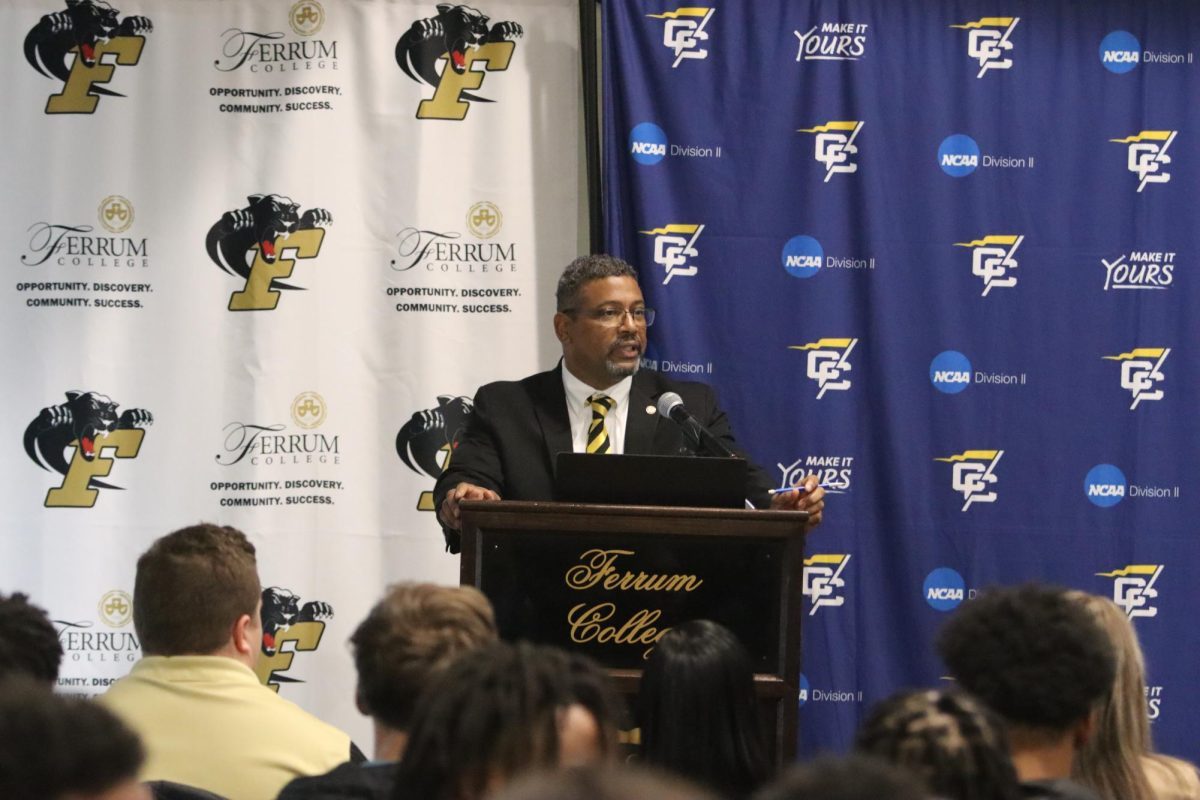 Athletic Director Cleive Adams speaks to students, faculty, and staff, following the official announcement of Ferrum College joining D-II Conference Carolinas next school year.