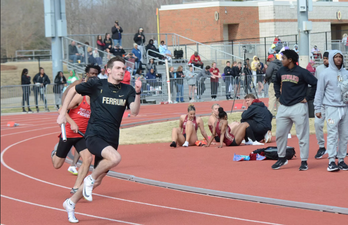 Junior Logan McClung sprints in the men's 4x400 track and field relay to bring the Panthers to a strong finish. 