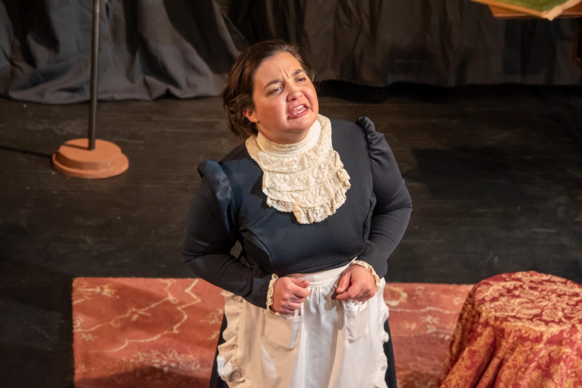 Theatre Arts Professor Emily Blankenship-Tucker performs as Katy Leary in 'You Caught Me Dancing'.