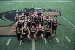 The Women's and Men's Cross Country teams pose for a photo as they begin the Fall 2025 season. 