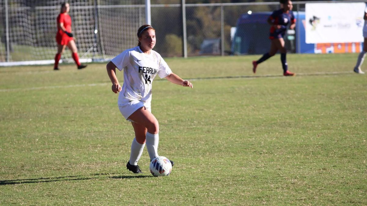 First-year Summer Stevens in possession of the ball. 
