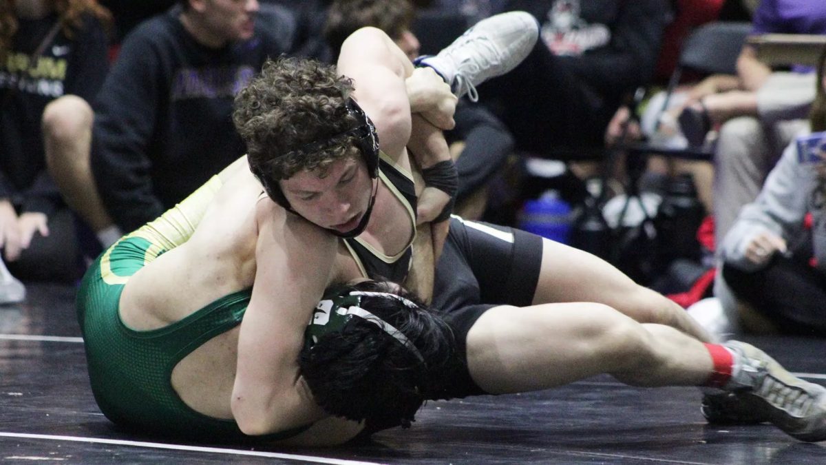 First-year Riley Conway wrestles his way to his first collegiate title. 