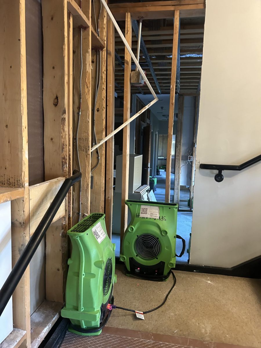 Industrial blowers work inside Moore Hall to rid the dorm of water and to quell mold growth.