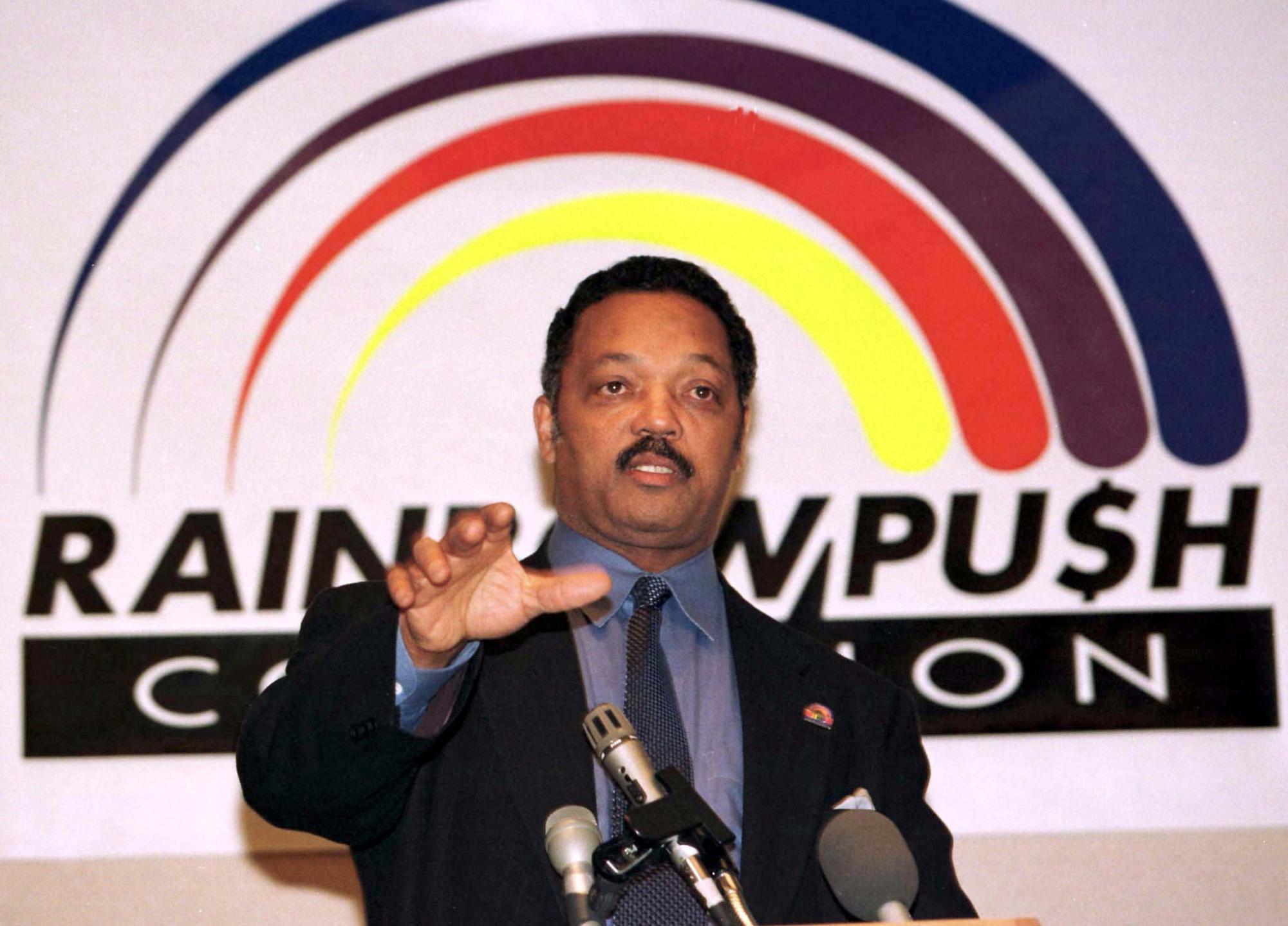 Jesse Jackson speaks at a news conference in New York, U.S. January 15, 1997 to announce an accord on the boycott of Mitsubishi Motors products and the company's work force diversity efforts. REUTERS/Mike Segar