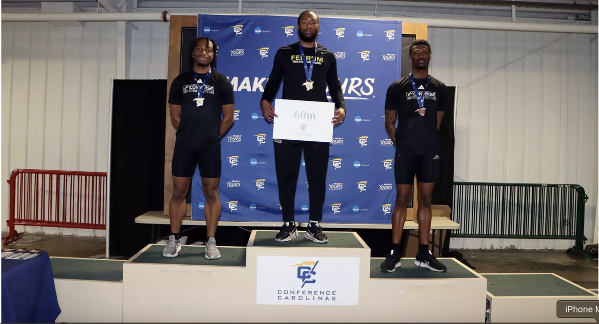 Sophomore Jahmal Jones , center, captures his first Conference Carolinas first place finish in the 60-meter race. 