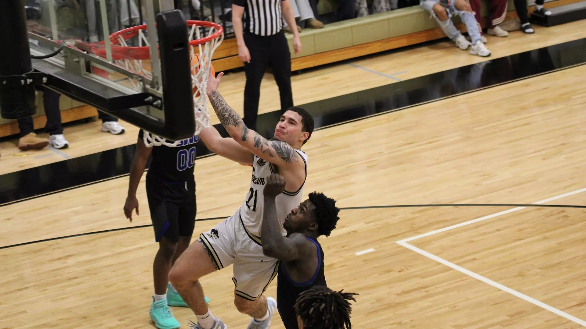 Gerren Jones, senior, drives for a layup while scoring 16 points for the Panthers.