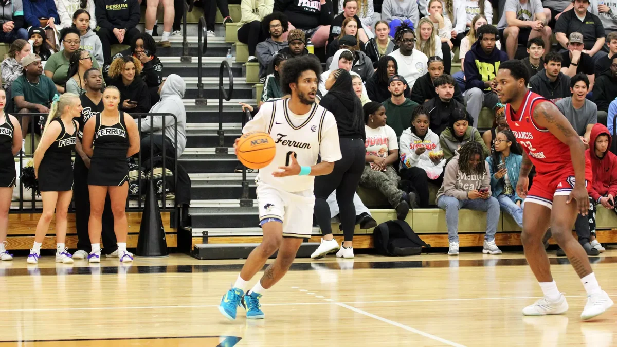 Rodrigo Farias controls the ball at the top of the key against Francis Marion at Swartz Gymnasium. Farias scored 25 points and went a perfect 15-for-15 from the free-throw line in the Panthers’ home victory.