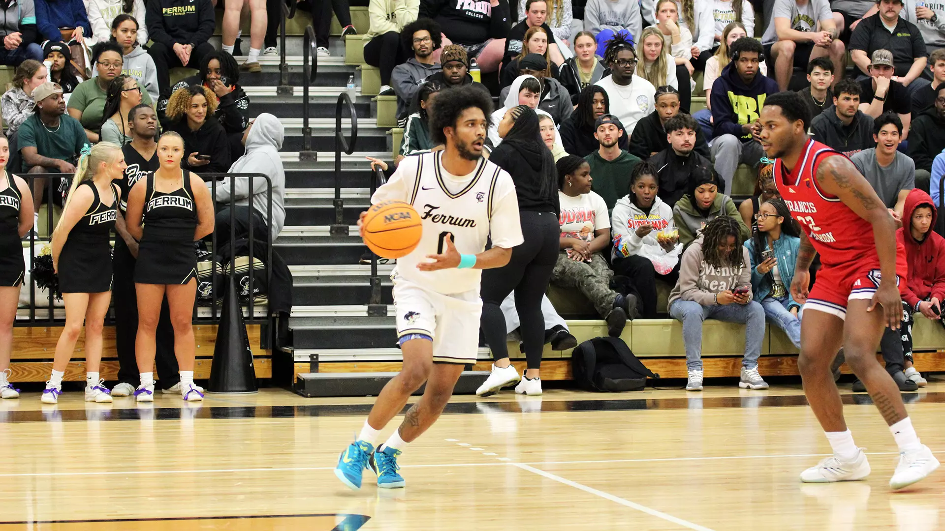 Rodrigo Farias controls the ball at the top of the key against Francis Marion at Swartz Gymnasium. Farias scored 25 points and went a perfect 15-for-15 from the free-throw line in the Panthers’ home victory.