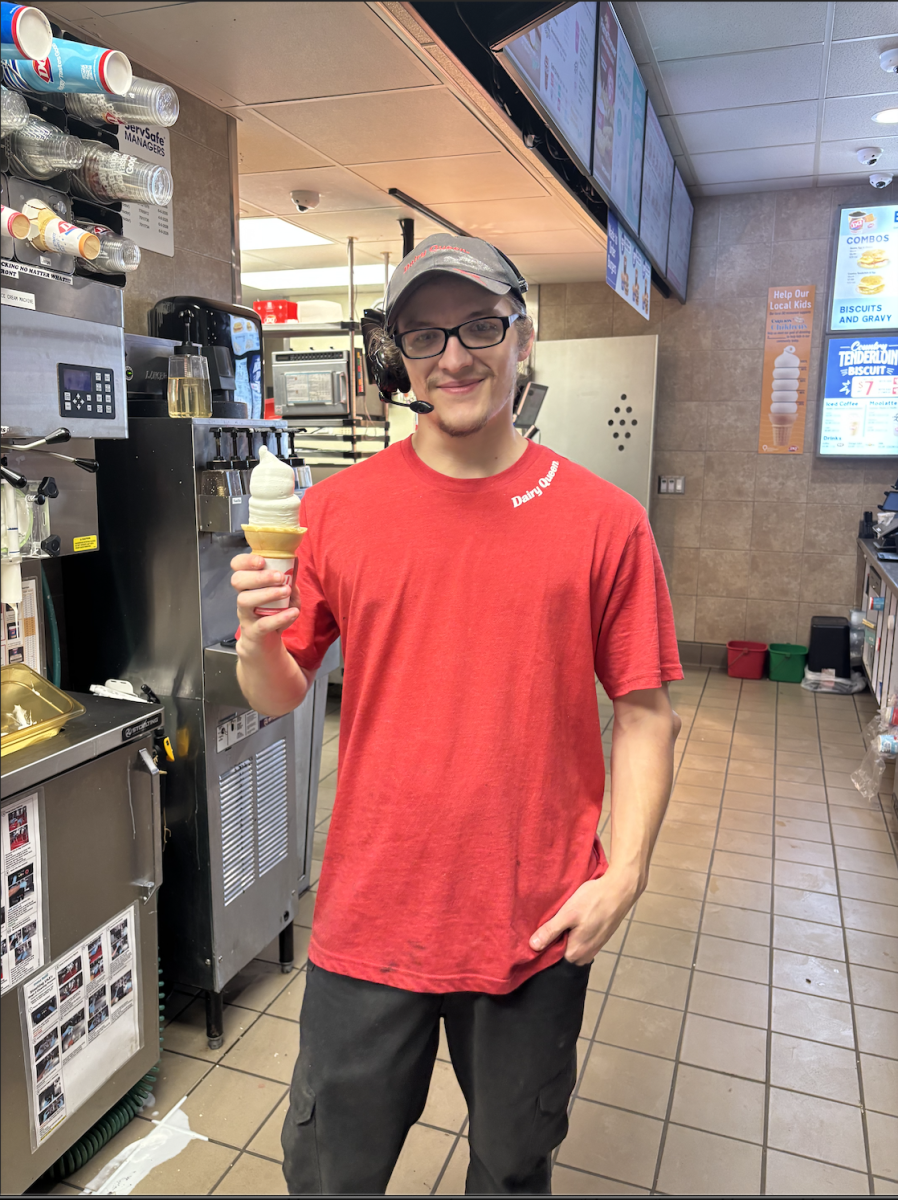 Local Dairy Queen employee, Dillon Mills, practices swirling his cones before Free Cone Day.