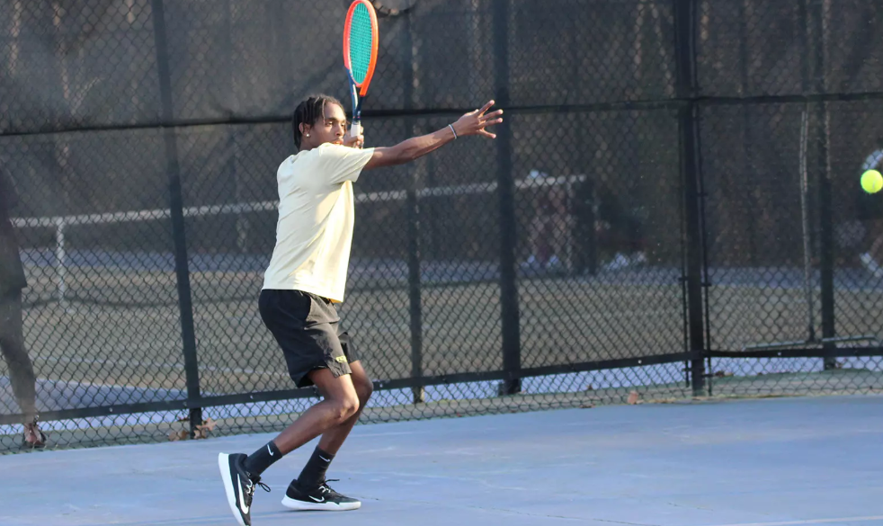 First-year Brian Karenzi strikes the ball with confidence, helping to secure the overall win.